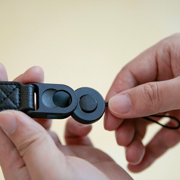 Attaching the Haida Leather Camera Wrist Strap in black