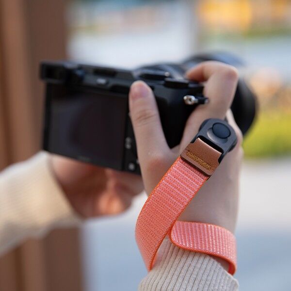 Overall view of the orange Haida nylon wrist strap
