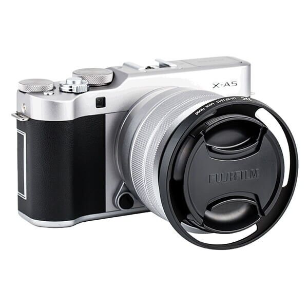 Fujifilm camera with lens hood attached