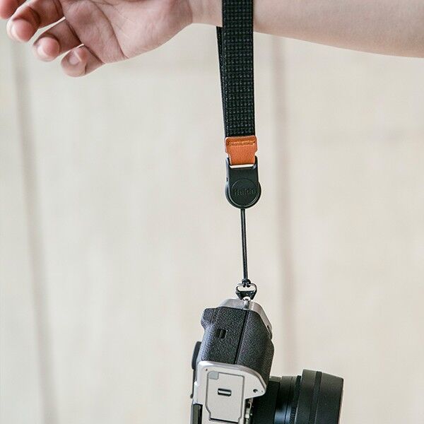 Haida wrist strap in black attached to the camera
