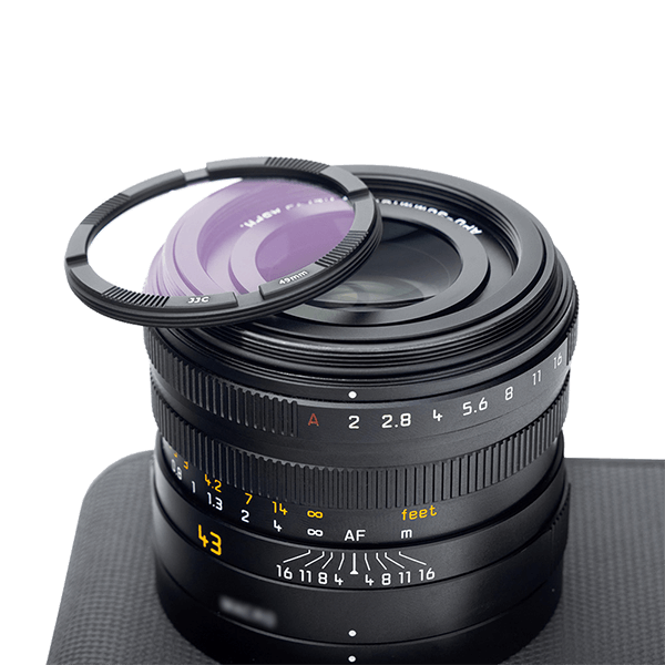 Multiple coating of the Leica Q3 UV filter in detail