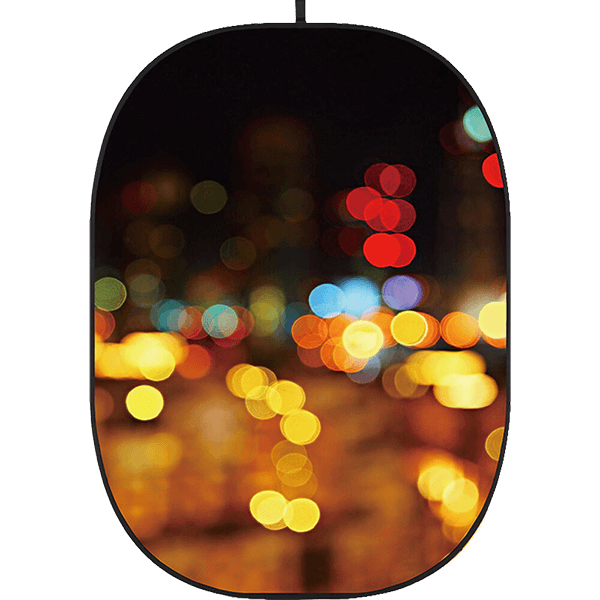Faltbarer Hintergrund mit dem Bokeh eines Lichtermeer