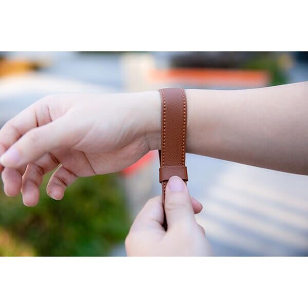 Haida Brown Leather Camera Hand Strap in use on a camera